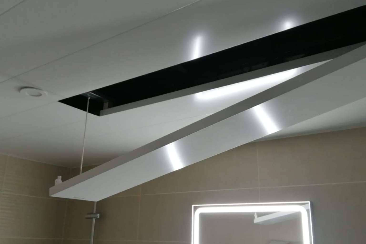 La empresa española DILUVID innova con puertas y tapas imantadas para techos de aluminio